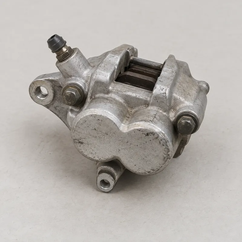 AI-generated illustrative demo image of GASGAS front brake caliper